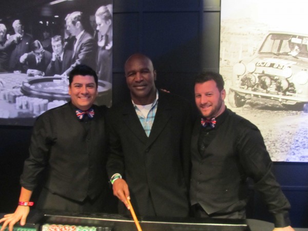 Evander Holyfield with our Craps Dealers in New York City Superbowl Party